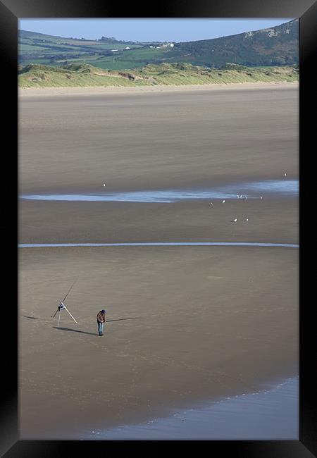 Fishing the beach Framed Print by Nick Fulford