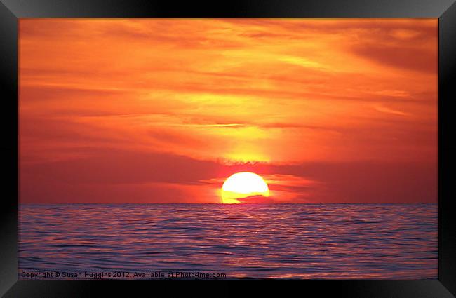 Ball of Fire Setting on The Sea Framed Print by Susan Medeiros