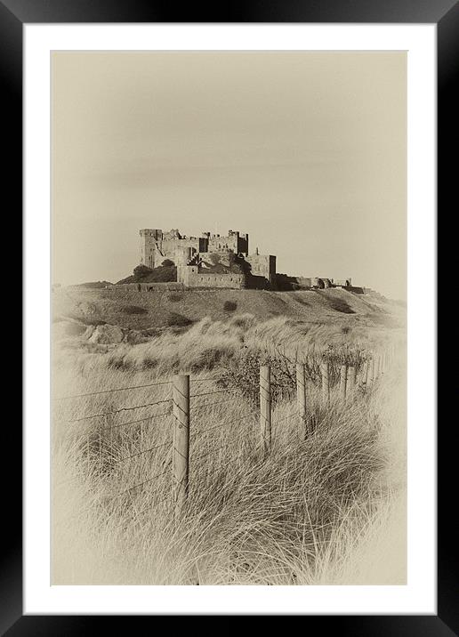 Bamburgh Castle vignette Framed Mounted Print by Graham Moore