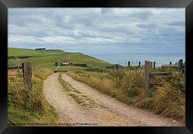 Above Ringstead Bay Framed Print by Phil Wareham