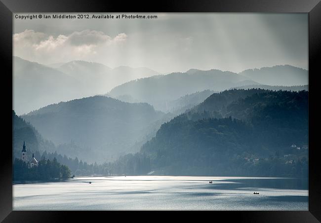 Breaking through the mist Framed Print by Ian Middleton