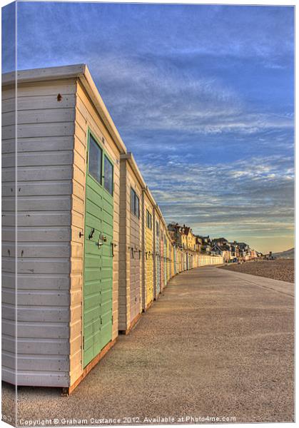 Lyme Regis beach huts Canvas Print by Graham Custance