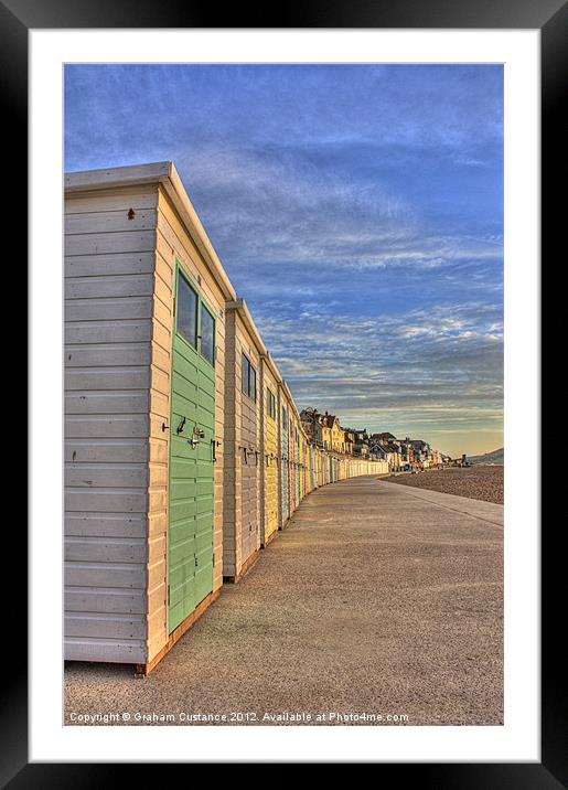 Lyme Regis beach huts Framed Mounted Print by Graham Custance