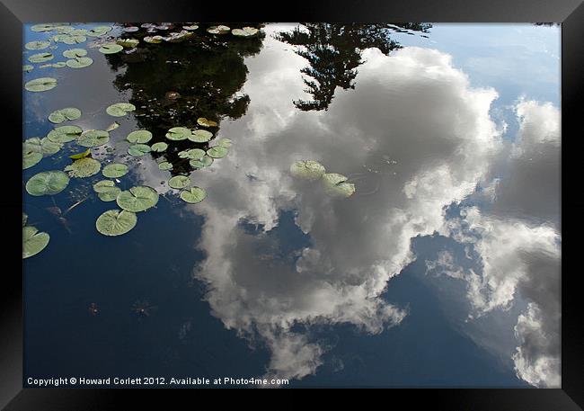 Reflected clouds Framed Print by Howard Corlett