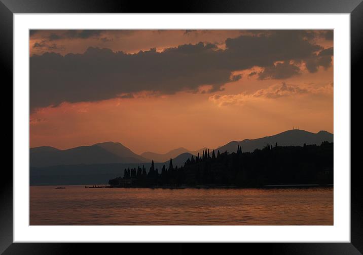 Sunset lake Garda Framed Mounted Print by Lynn hanlon