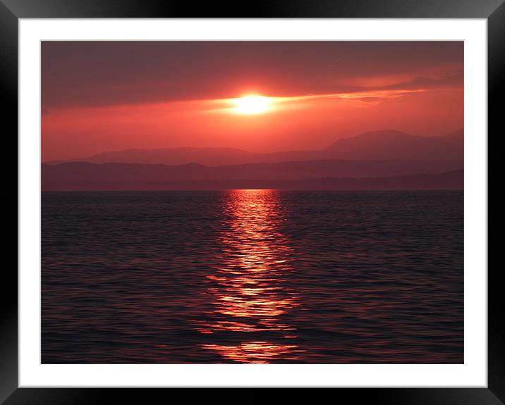 Sunset on lake Garda Framed Mounted Print by Lynn hanlon