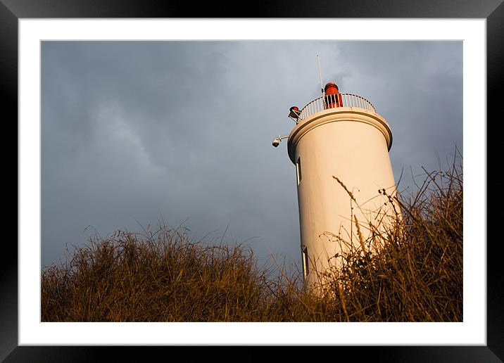 Lighthouse at dawn Framed Mounted Print by Ian Jones