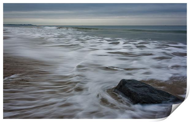 Ebb tide and a rock Print by Ian Jones