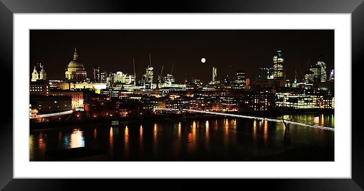 London by night with reflections Framed Mounted Print by Linda More