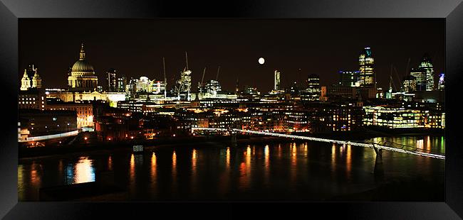 London by night with reflections Framed Print by Linda More