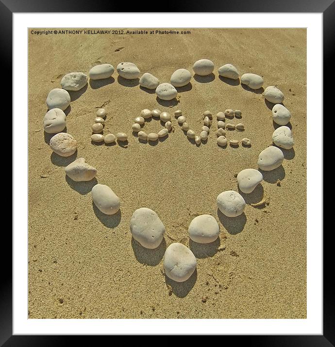 love pebbles in the sand Framed Mounted Print by Anthony Kellaway