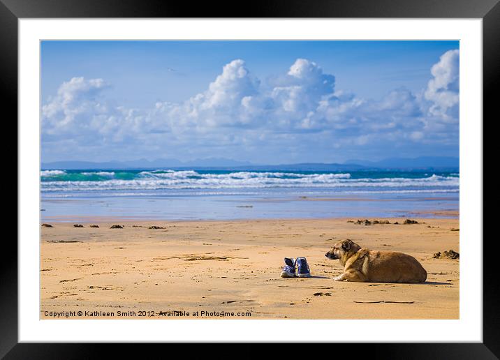 Dog and sneakers on beach Framed Mounted Print by Kathleen Smith (kbhsphoto)