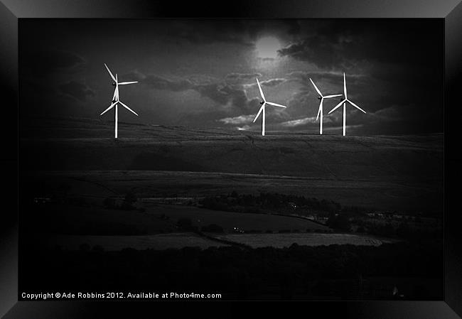 In The Shadows of the Wind Turbines Framed Print by Ade Robbins