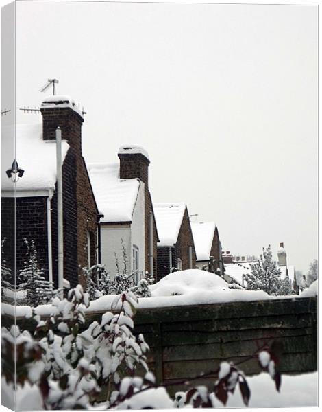 Rooftops in the snow Canvas Print by claire beevis
