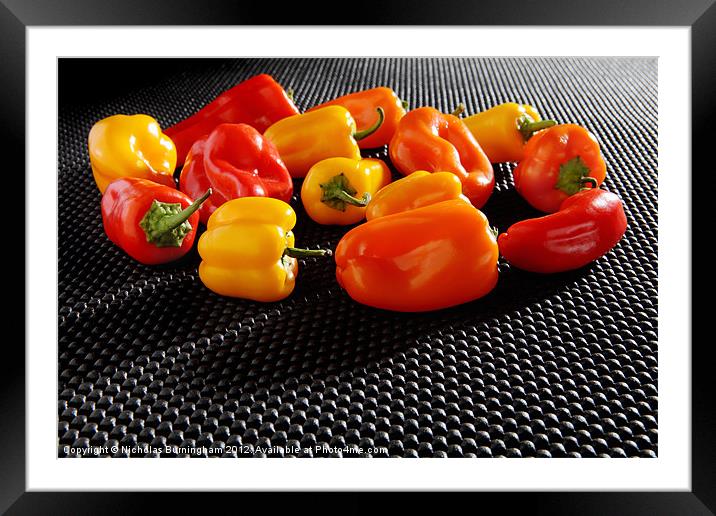 Red, Orange and Yellow Mini Bell Peppers Framed Mounted Print by Nicholas Burningham
