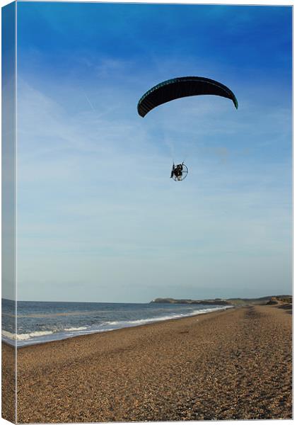 Paramotoring Along The Beach Canvas Print by Adrian Wilkins
