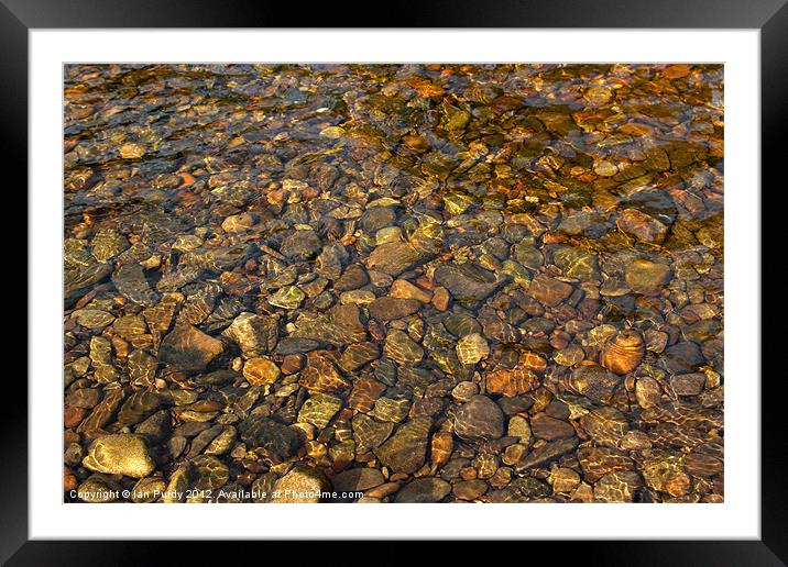 Pebbles through water Framed Mounted Print by Ian Purdy