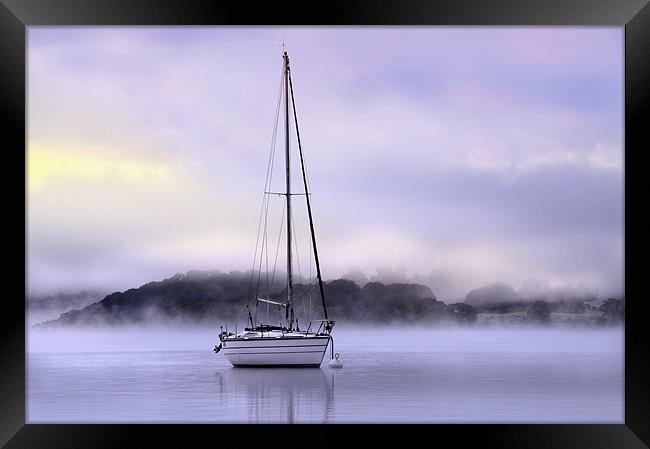 Boat in the dawn mist Framed Print by Robert Fielding