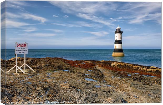 Penmon Point Lighthouse Canvas Print by Adrian Evans