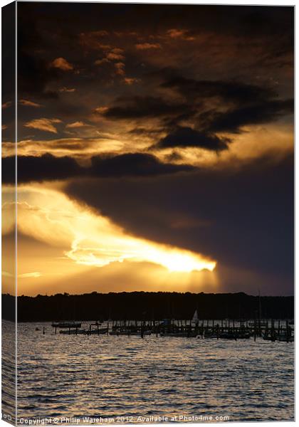 Sun and Cloud over Brownsea Canvas Print by Phil Wareham