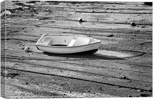 White dinghy at low tide Canvas Print by Louise Heusinkveld