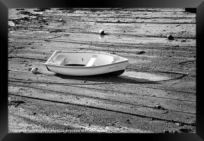 White dinghy at low tide Framed Print by Louise Heusinkveld