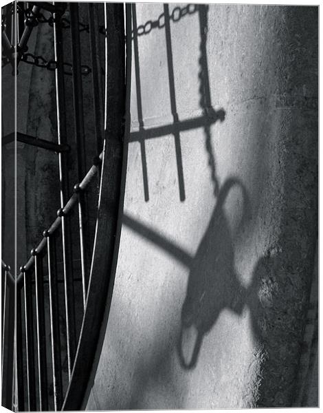 Shadow on a well Canvas Print by Benoit Charon