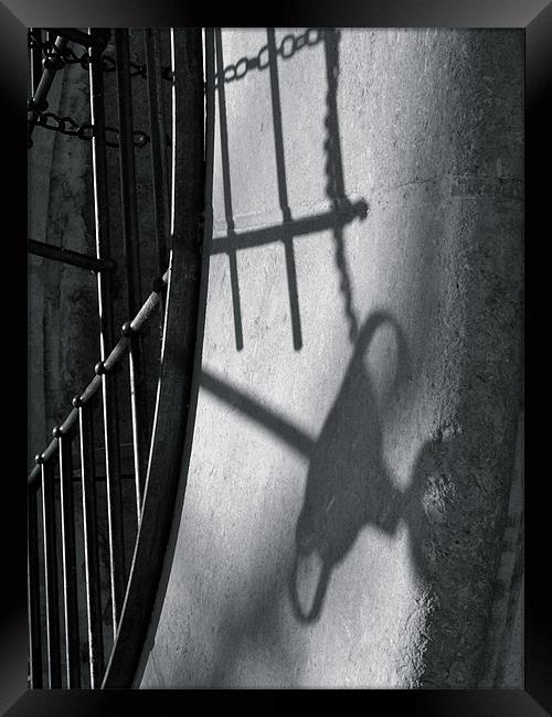 Shadow on a well Framed Print by Benoit Charon