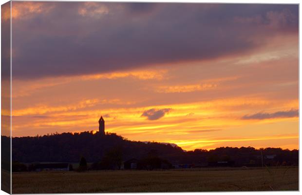 October Sunset behind The Wallace Monument Canvas Print by Richard Westwood