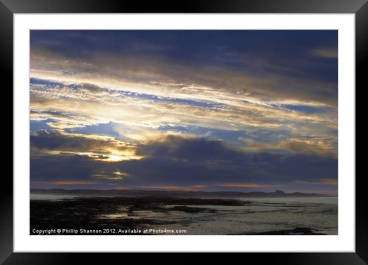 Sun set over coast Framed Mounted Print by Phillip Shannon