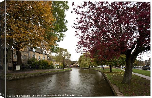 Bourton on the Water, Cotswolds Canvas Print by Graham Custance