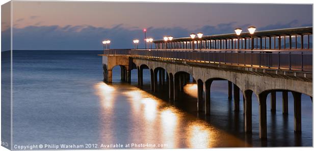 Lights on the pier Canvas Print by Phil Wareham