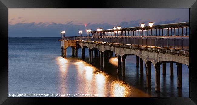 Lights on the pier Framed Print by Phil Wareham
