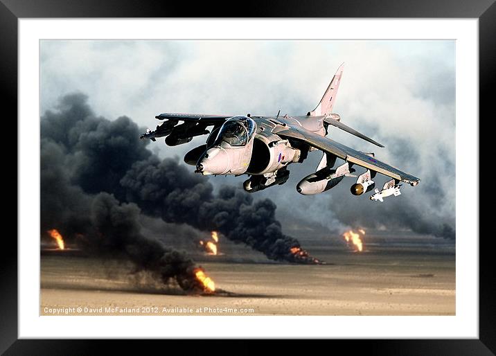 Low-level Harrier over burning oil wells Framed Mounted Print by David McFarland