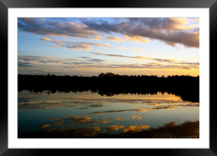 Cloudy Reflections Framed Mounted Print by Sarah George