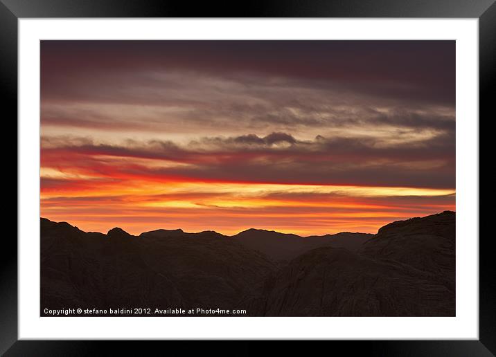 Sunset through clouds Framed Mounted Print by stefano baldini
