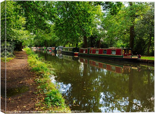 Narrowboats moored on the Wey Navigation in Surrey Canvas Print by Louise Heusinkveld