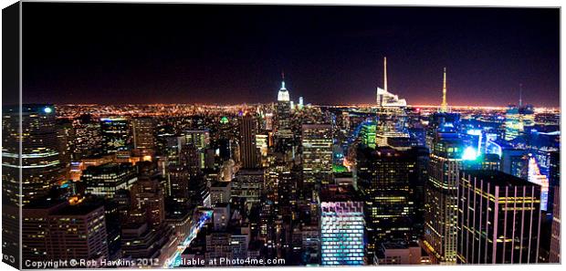 Manhattan Skyline by night Canvas Print by Rob Hawkins