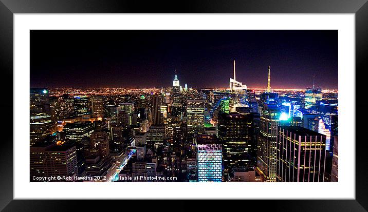 Manhattan Skyline by night Framed Mounted Print by Rob Hawkins