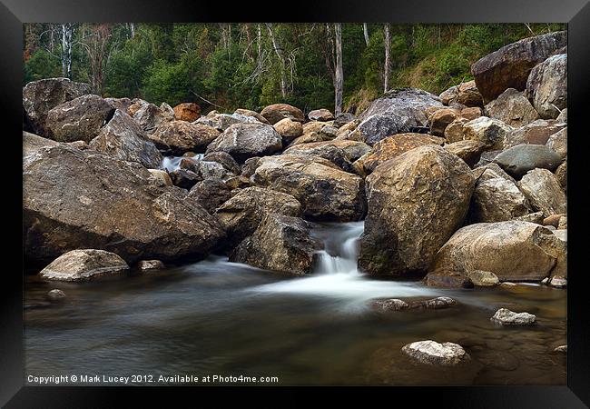 Boulders on the River Framed Print by Mark Lucey