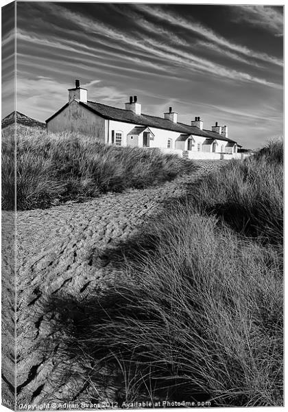 Pilot Cottages Llanddwyn Island Anglesey Canvas Print by Adrian Evans