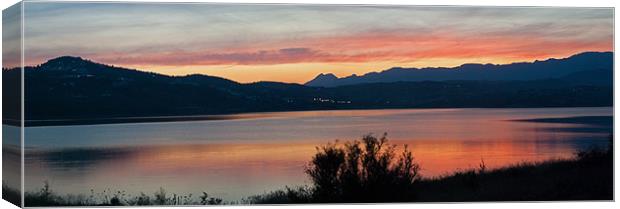 Sunset over Lake Viñuela Canvas Print by Barry Foote