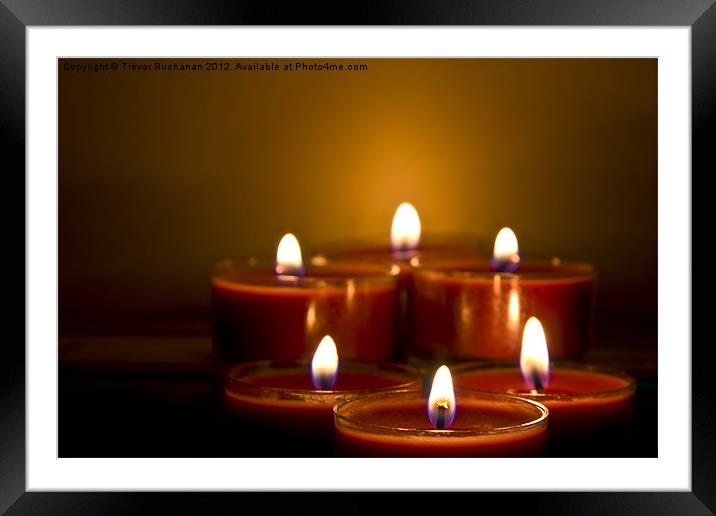 Candle light Framed Mounted Print by Trevor Buchanan