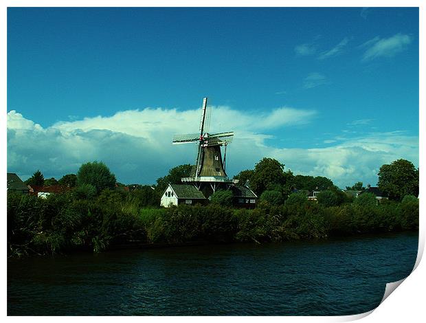 Dutch windmill on windy day Print by Malcolm Snook