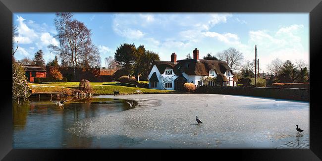 Thatched Cottage and Pond Framed Print by paul lewis