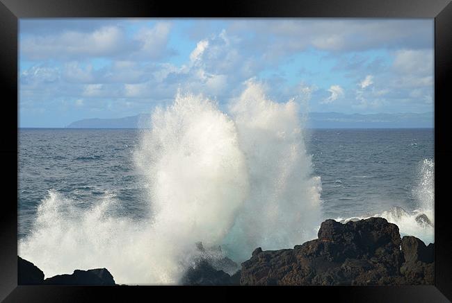 Waves crashing on lava shore Framed Print by Malcolm Snook