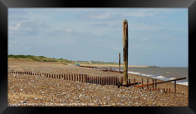 Poles Down The Beach Framed Print by philip milner