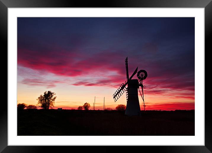 Fire in the sky at Thurne Framed Mounted Print by Paul Macro