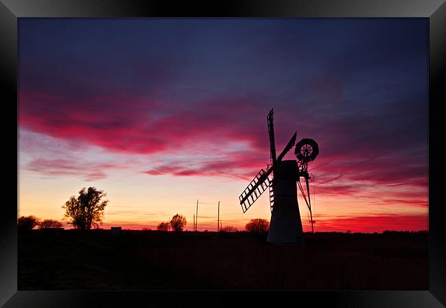 Fire in the sky at Thurne Framed Print by Paul Macro