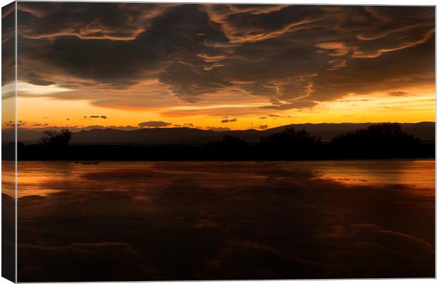 Angry sunset. Canvas Print by David Hare